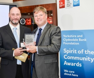 WWT Washington’s reserve manager John Gowland accepting the award from John Hooper, Chief Operating Officer at Clydesdale and Yorkshire Banks