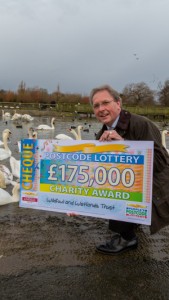 WWT Chief Executive Martin Spray CBE accepts the generous cheque