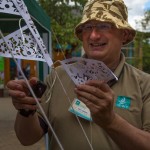 Volunteer, Nev Harkin, hanging bunting at London