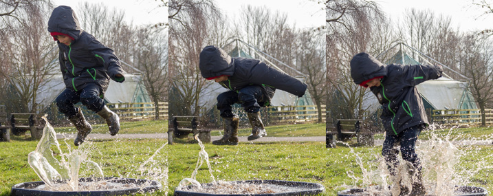 A child puddle jumping by Nick-Brooks