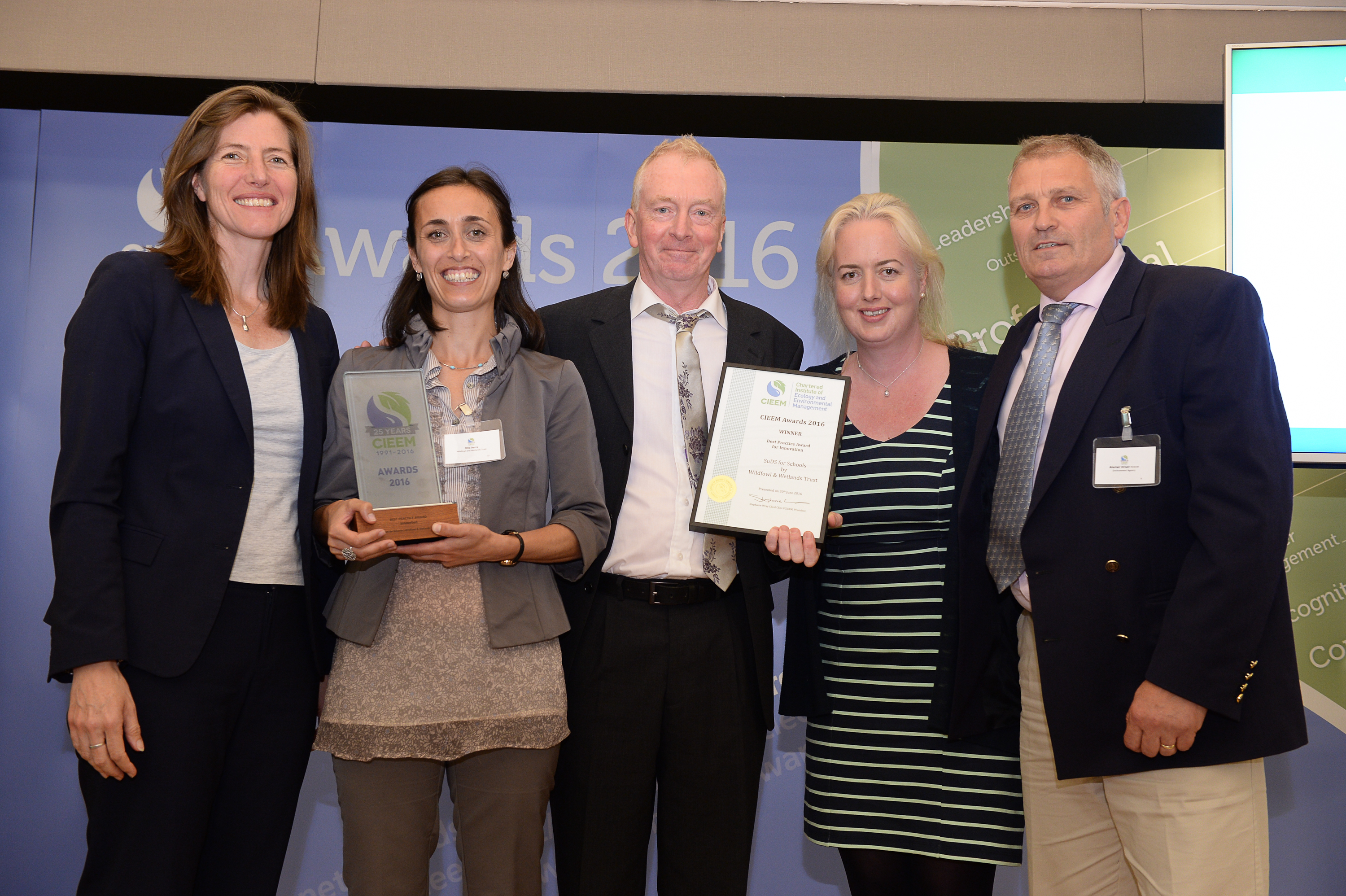 Wildlife Trusts CEO Stephanie Hilborne presents the CIEEM Award to WWT SuDS Project Officer Rita Serra, Andy Graham, Rosemary Waugh and Alastair Driver