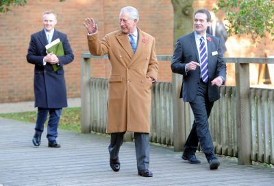 HRH waves to visitors as he arrives