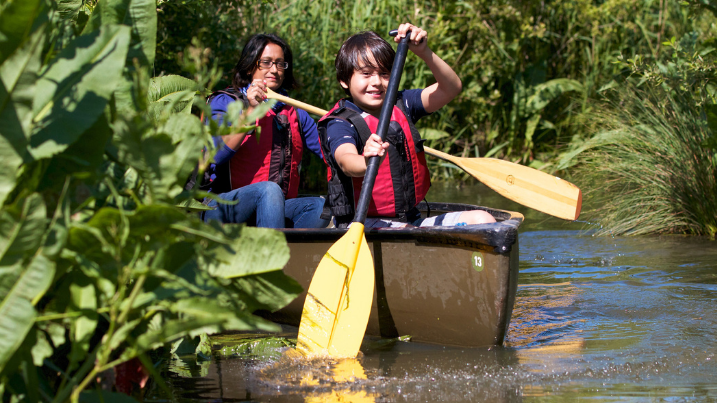 Family on a wetland canoe safari